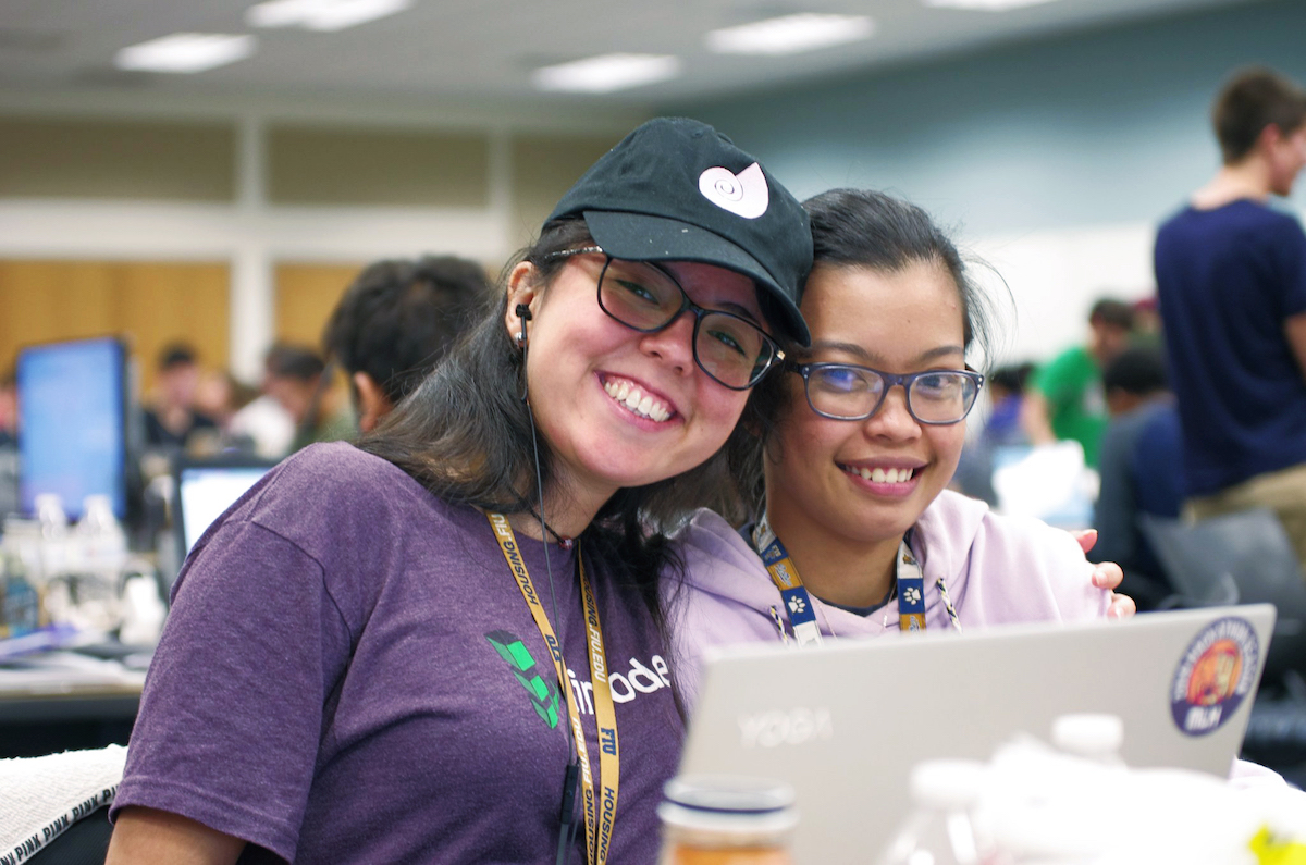 Picture of Hackers surrounding a table