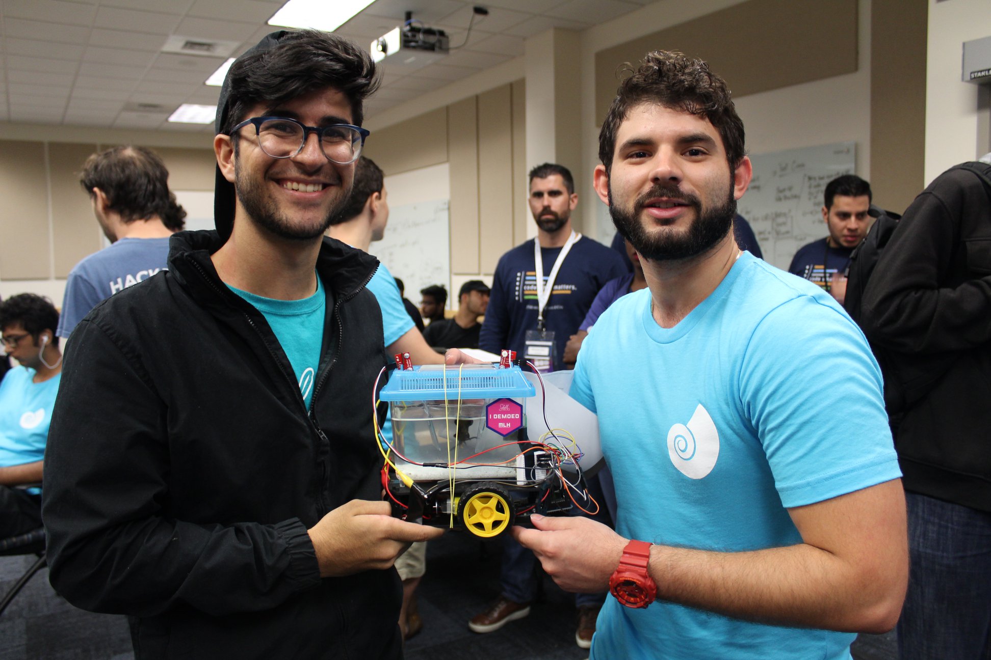 Picture of Hackers surrounding a table